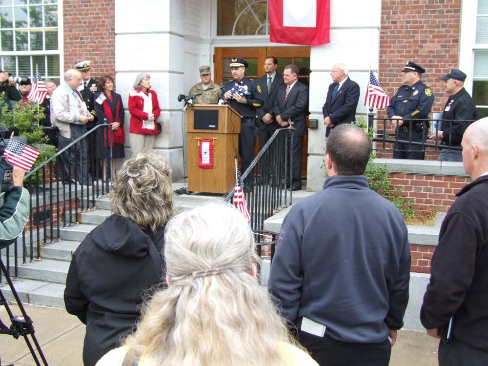 Chief Michael Peraino accepting flag 2